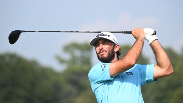 Max Homa tees off at the TOUR Championship golf tournament at East Lake Golf Club.